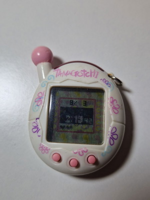 Tamagotchi like new and functional