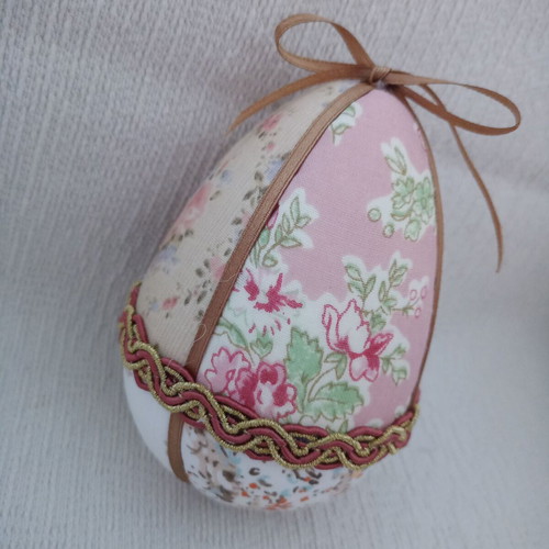 Decorative egg used beige pink floral for Easter and spring decor