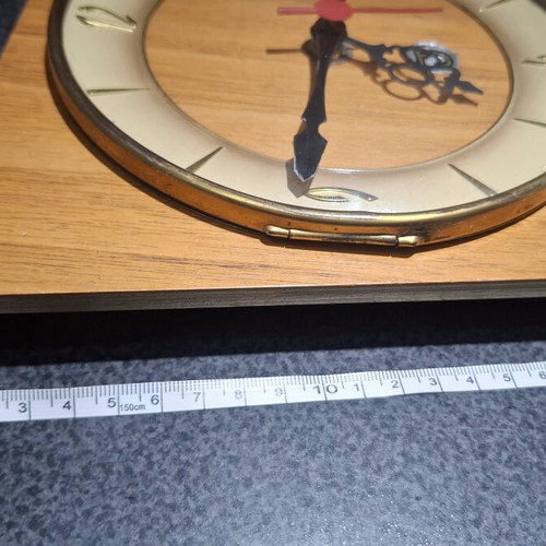 Mid-Century Modern wall clock like new with rope and wood