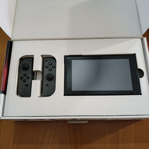 Nintendo Switch used with gray joy-con, model HAC-001, complete set