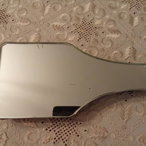 Mirror with pebble decoration