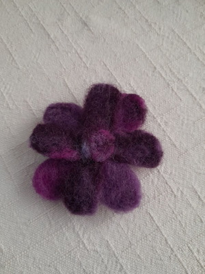 Handmade wool flower brooch in purple and magenta shades like new