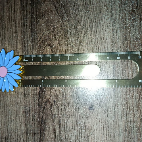 Metal ruler with flower bookmark