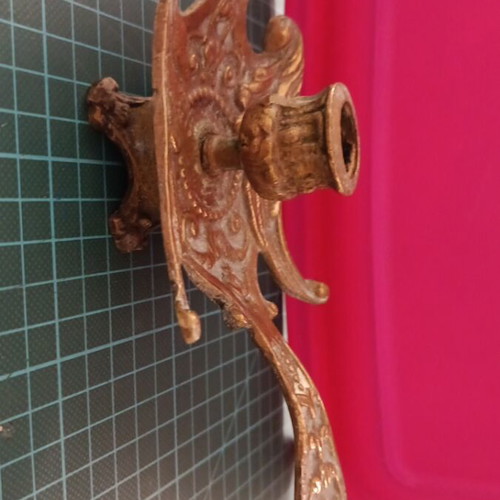 Bronze candlestick used, baroque style with embossed decoration