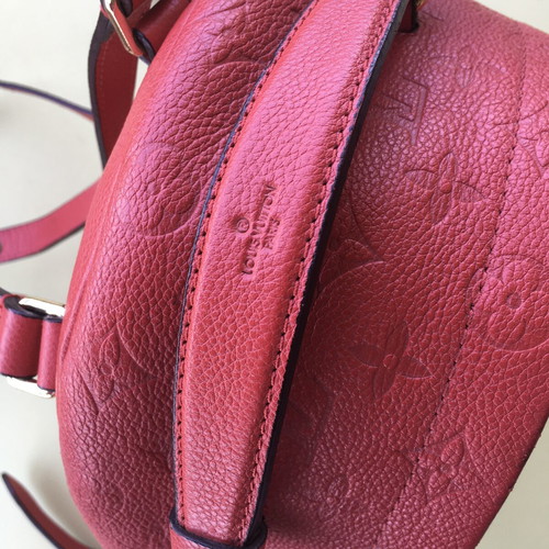 LV backpack small size as new, red
