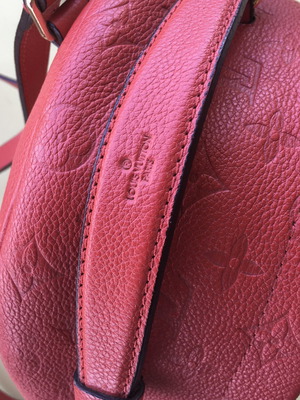 LV backpack small size as new, red