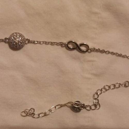 Silver bracelet with stones and infinity symbol like new