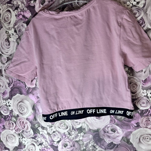 Pink short-sleeve crop top with black elastic band, size M