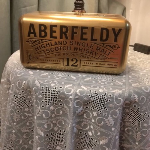 Metal Bottle Case like new with collectible bottle