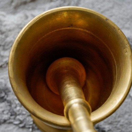Authentic vintage mortar with pestle made of brass like new