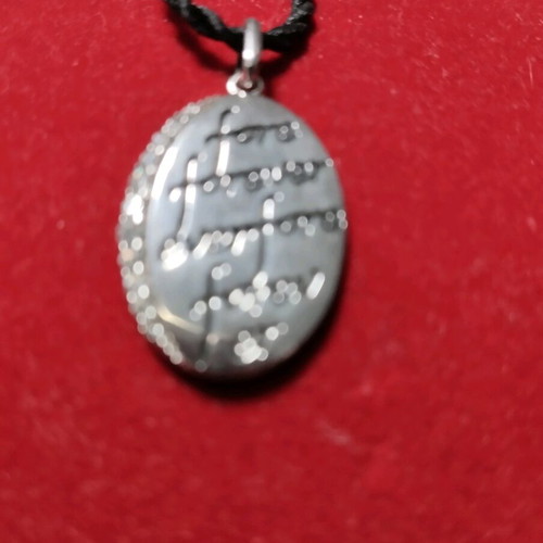 Galerie Tsangarakis silver pendant like new with white sapphires