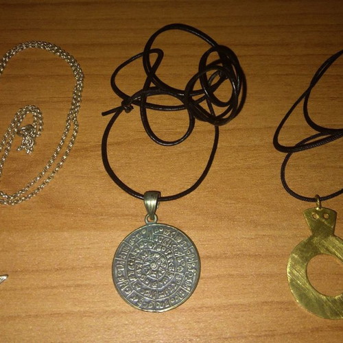 Archaeological-themed pendants pack of 3 in excellent condition