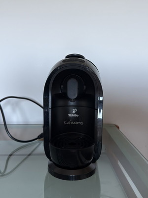 Tchibo Cafissimo coffee machine with reusable metal capsule, used