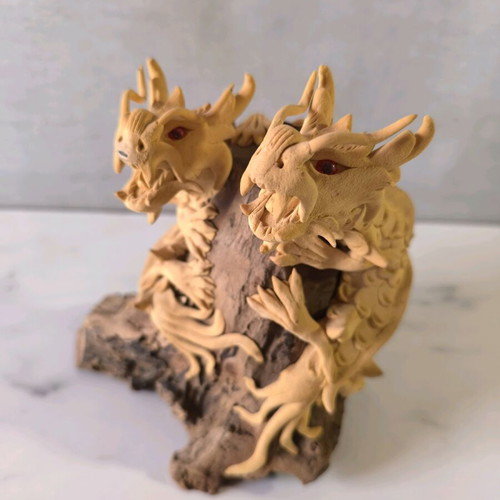 Wooden carved dragons used on wooden base