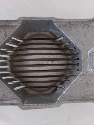 Vintage egg slicer used, aluminum and wire