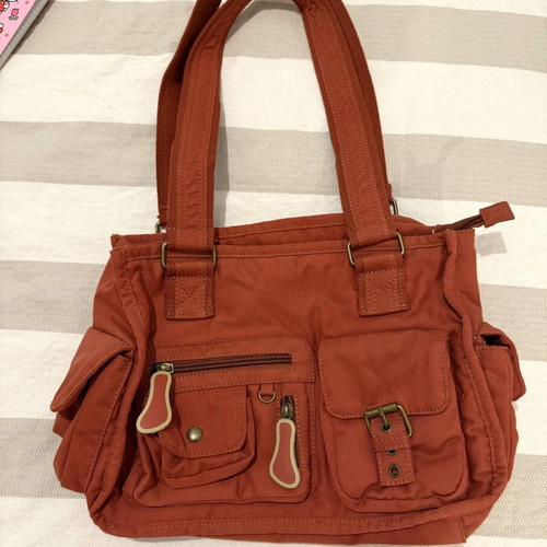Shoulder bag in warm terracotta color like new