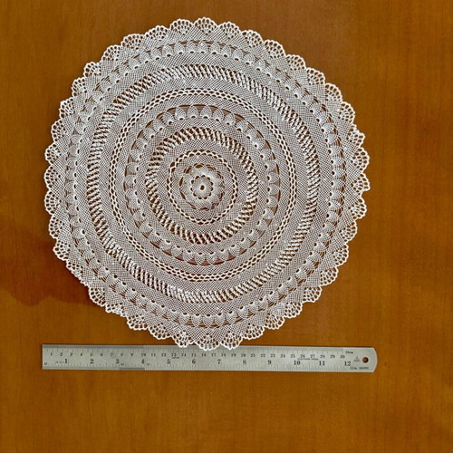 Handmade small doilies set of 9 like new