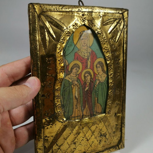 Old metal icon of Saint Sophia with the three daughters used