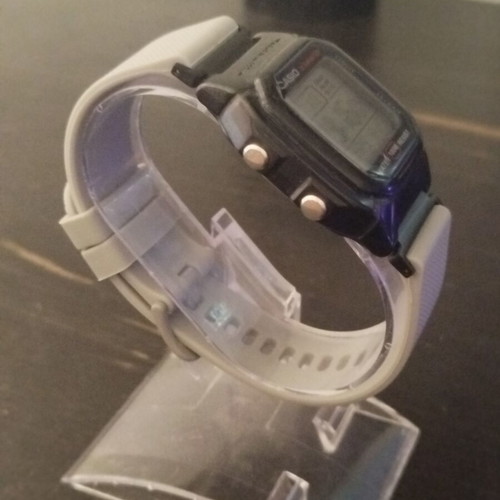 Casio W800H watch with two straps, grey and black