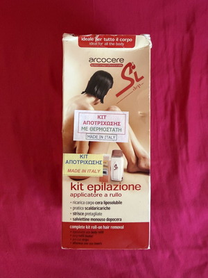 Hair removal kit with wax heater, like new, includes 25 strips and wipes
