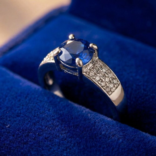 Ring like new with blue stone and rhinestones