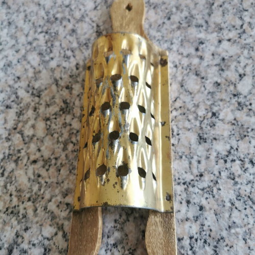 Traditional grater used for quince and hard cheese