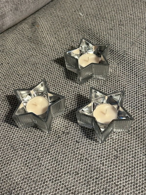 Glass candlesticks like new, set of three