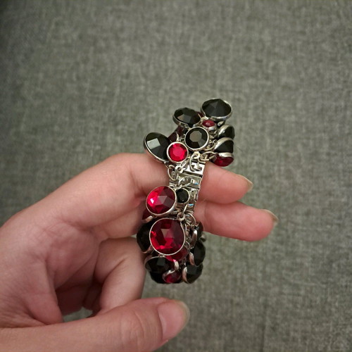 Bracelet with black and red stones adjustable size like new