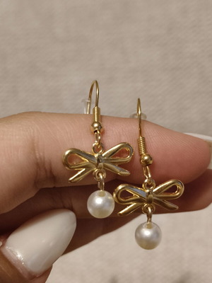 Handmade stainless steel earrings with bow and pearls