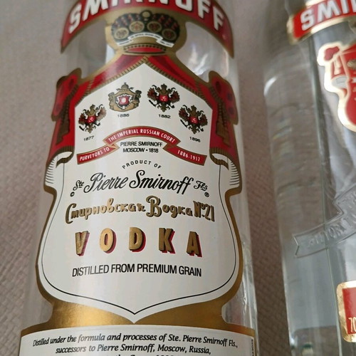 Pack of 2 old drinks, 1 vodka and 1 Bacardi, like new