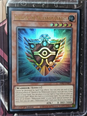 Shield Of the Millennium Dynasty card like new with Ultra Pro sleeve and Top Loader