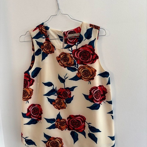 Sleeveless blouse like new with red flowers Darling, ecru