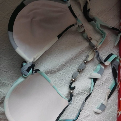 Swimsuit used in blue shades with padding and adjustable ties