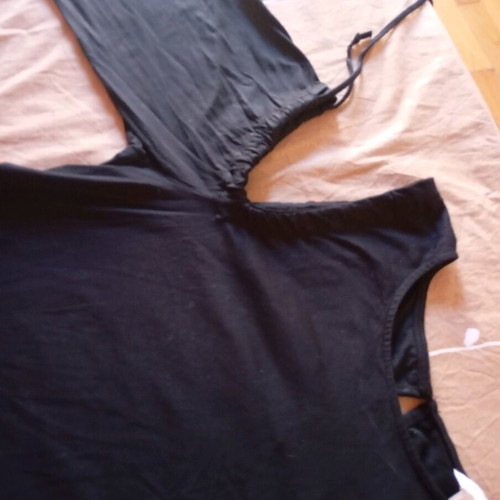 H&M black blouse with shoulder cutouts and cords, new