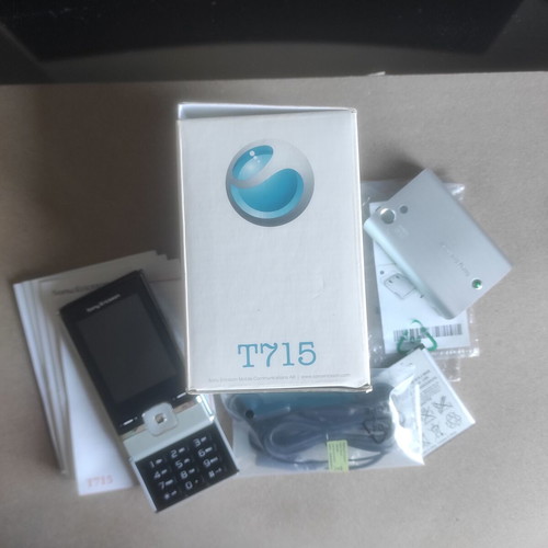 Sony Ericsson T715 box with original accessories and non-working device used