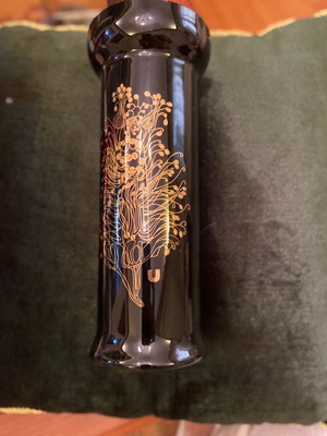 Black glass vase with engraved gold decoration used