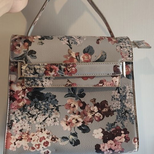 Blue floral handbag with matching strap