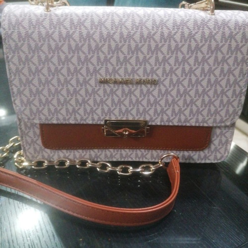Shoulder bag used with strap for hand and shoulder