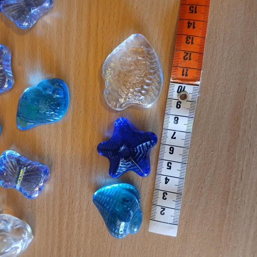 Glass decorative items used, set of 14, shells and stars