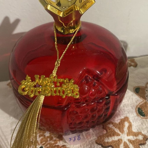 Soy candle new with melomakarono scent in glass pomegranate container