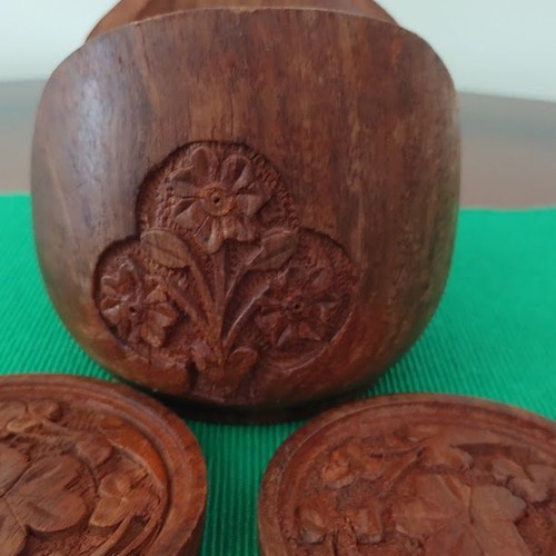 Handmade wooden coasters like new, set of six with carved floral designs