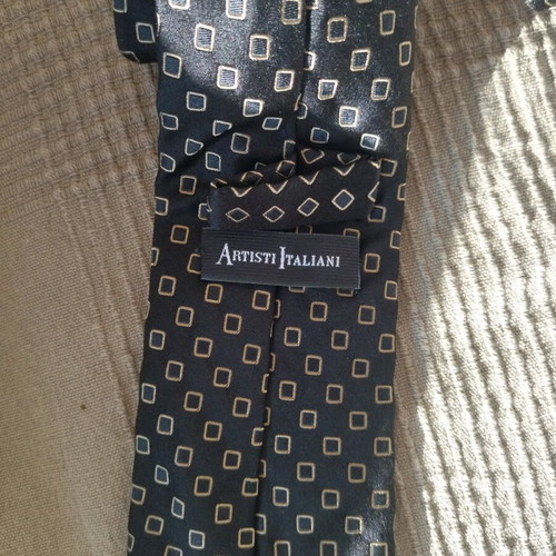 Artisti Italiani men's tie with dark blue lacunary pattern, new