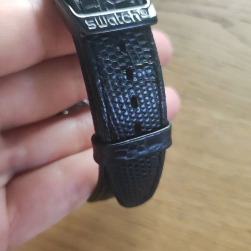 Swatch Black Nachtigall wristwatch YWB403, black dial with rose gold accents