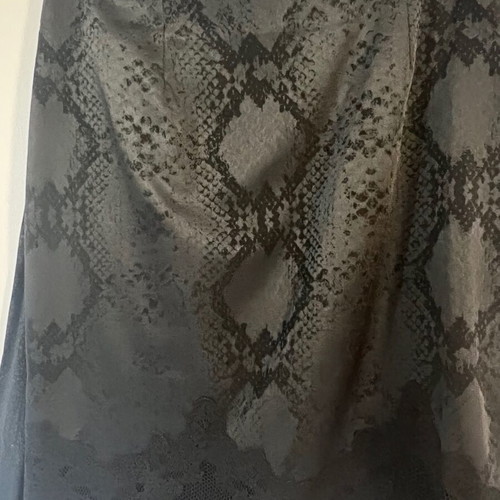 Lauren Vidal short skirt with snake skin pattern and lace trim
