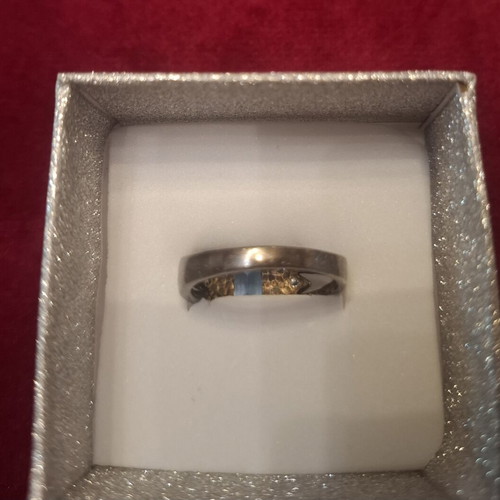 Silver ring with central blue topaz, like new