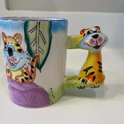 Tiger design mug used, small rim damages