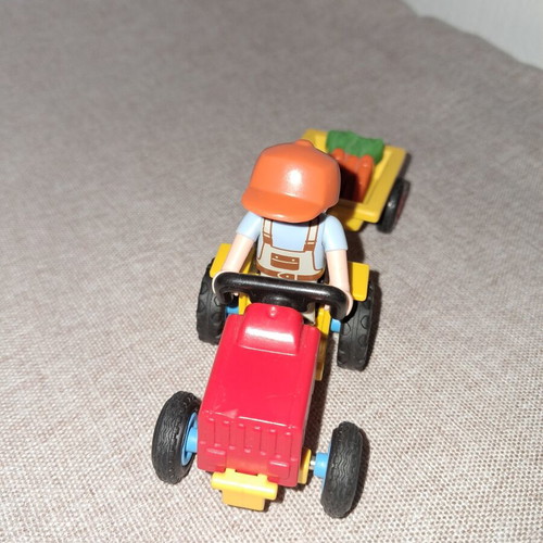 Playmobil small farmer figure with tractor like new