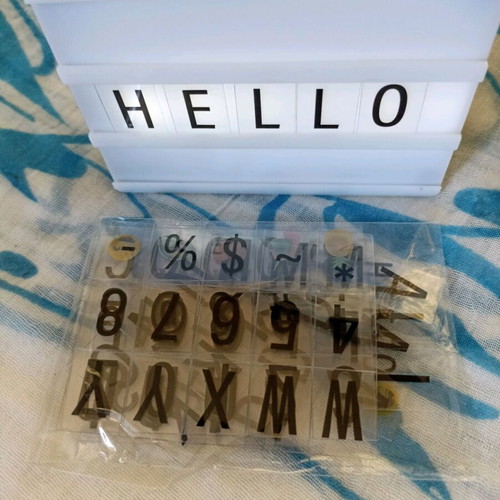 Table lamp with plastic letters used