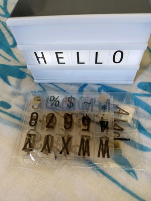 Table lamp with plastic letters used