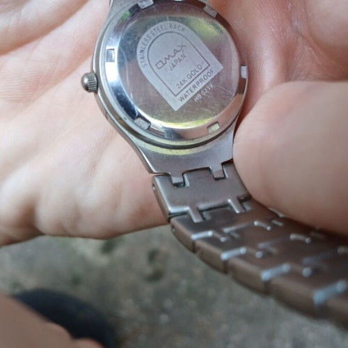 Omax Quartz Model HB 0239 watch like new, silver unisex